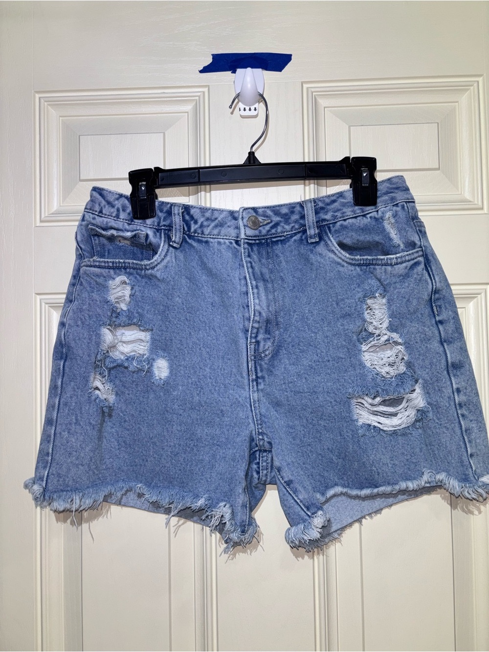 High-Rise Light Blue Distressed Denim Shorts